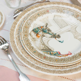 Quatre assiettes à dessert "Chevaux du vent"